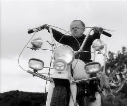 Hombre on a motorcycle