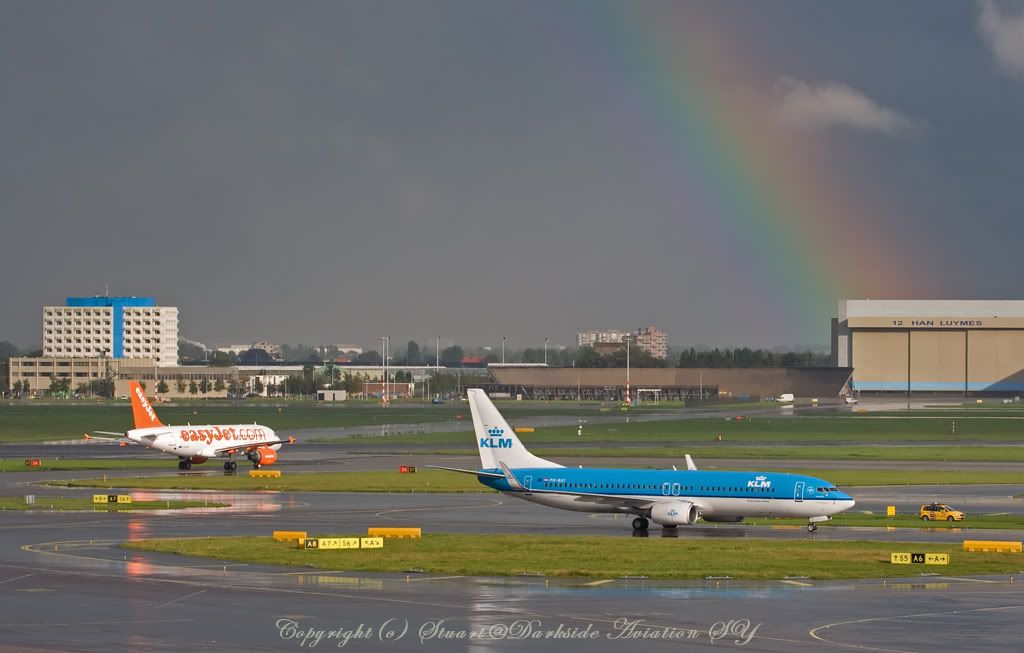 http://i256.photobucket.com/albums/hh186/thresholdkid/Schiphol/Rainbow-Lscape-border.jpg