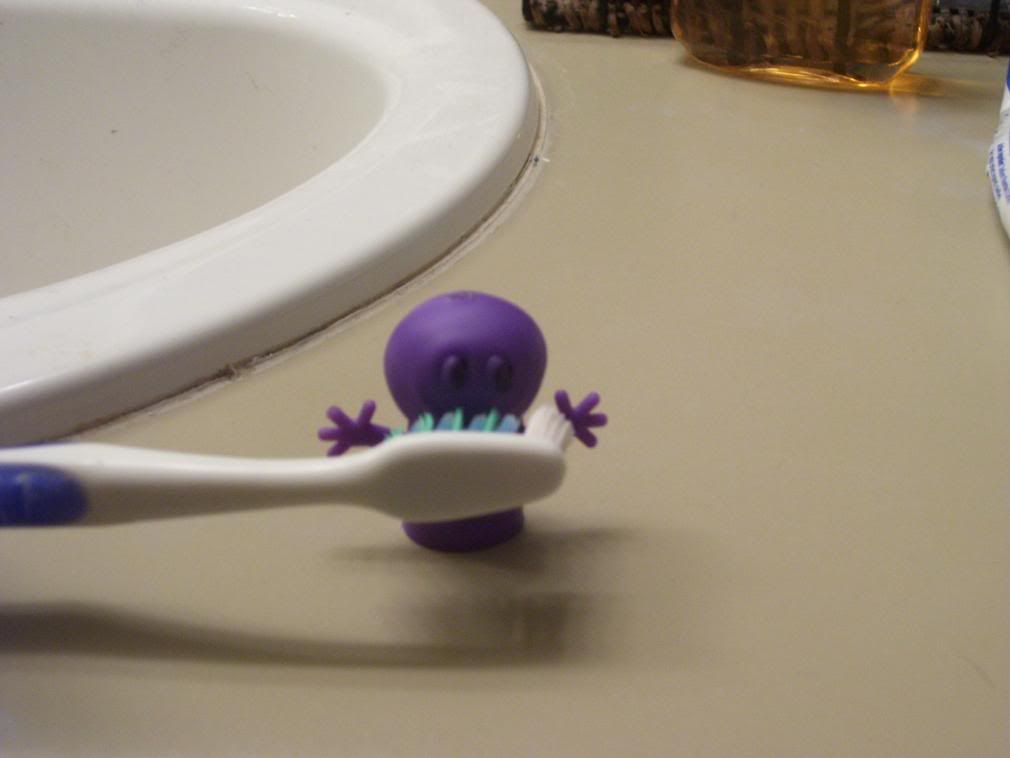 Purple Man also always brushing his teeth after eating Pictures, Images and Photos