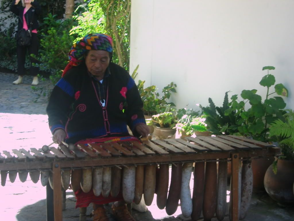 Local woman playing a traditional instrument